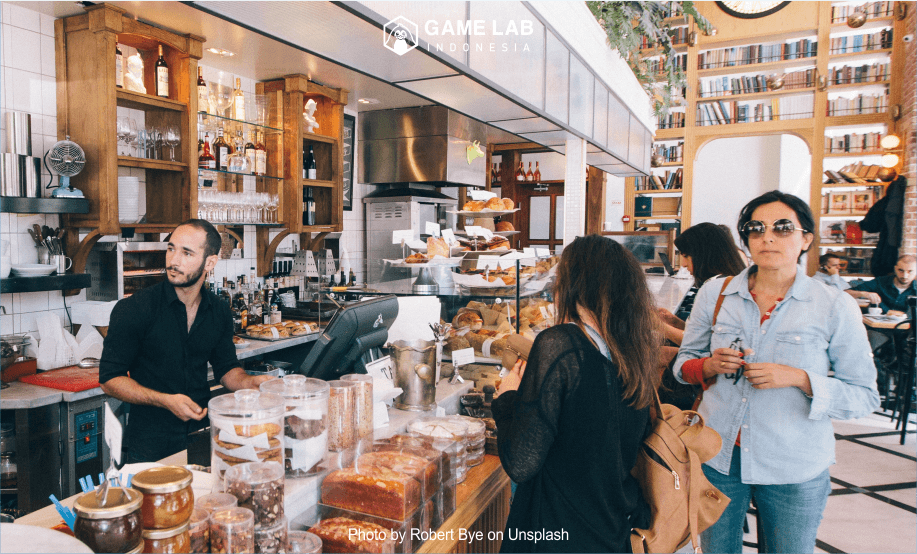"woman standing on food counter" Photo by Robert Bye on Unsplash 