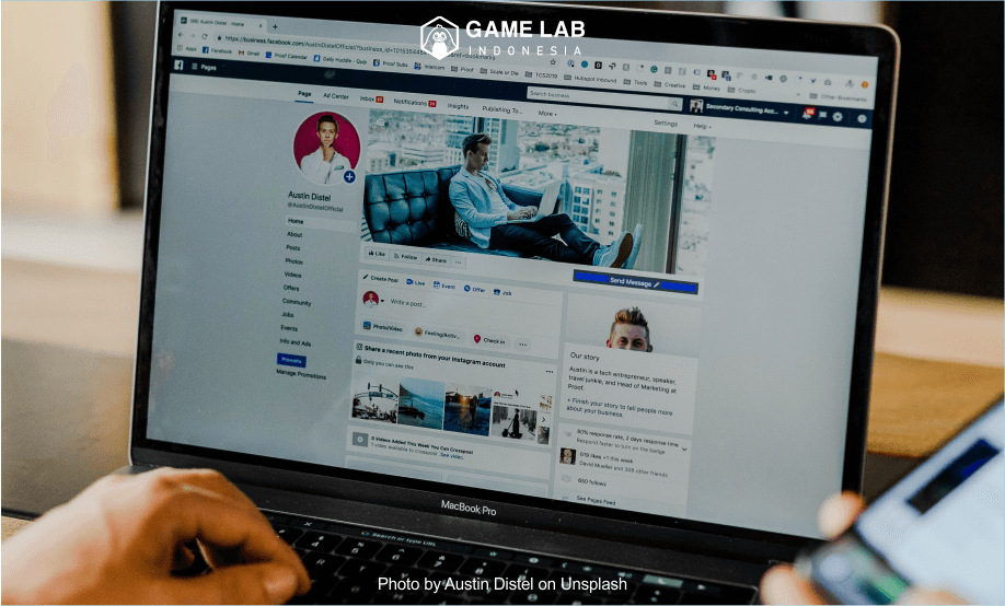  "person using both laptop and smartphone" Photo by Austin Distel on Unsplash 