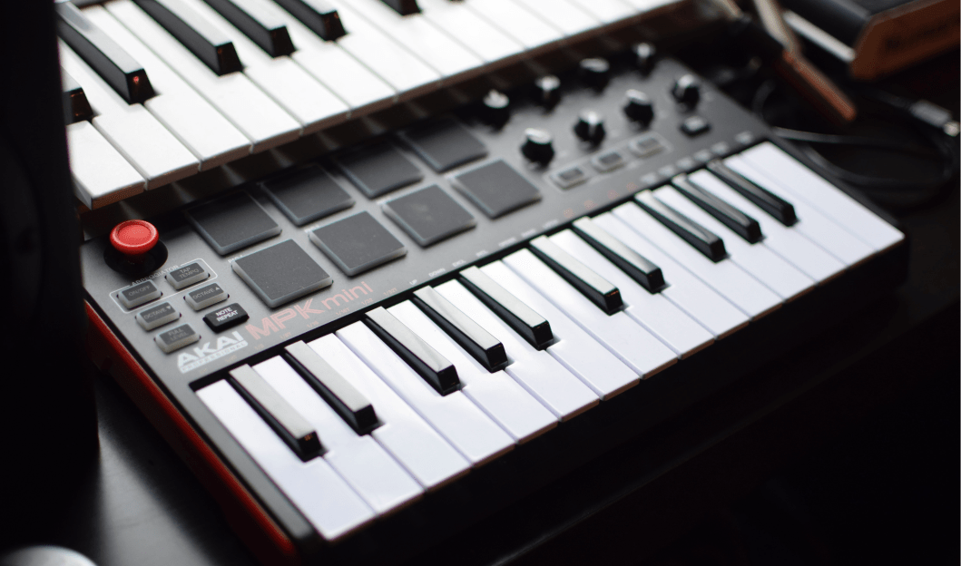 "black and white Akai MPK mini launch pad" Photo by Cedrik Malabanan on Unsplash
